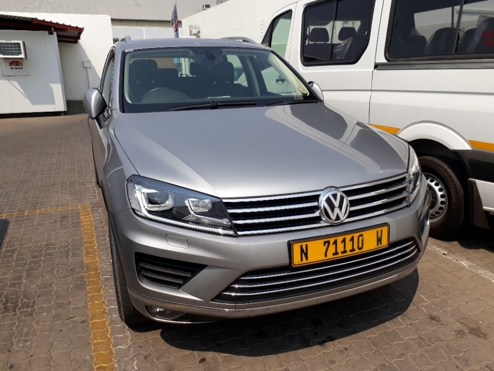 Стекла фар touareg gp