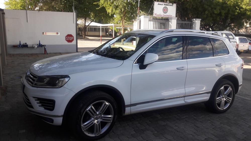 Стекла фар touareg gp
